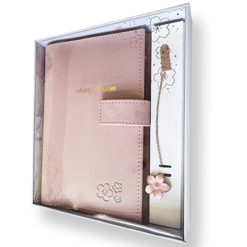 SAKURA journal for girls in trendy fashion colors with high-quality paper, compact design, button flap, brass floral bookmark, and gift box packaging. Victoria's Journals. Pink Green