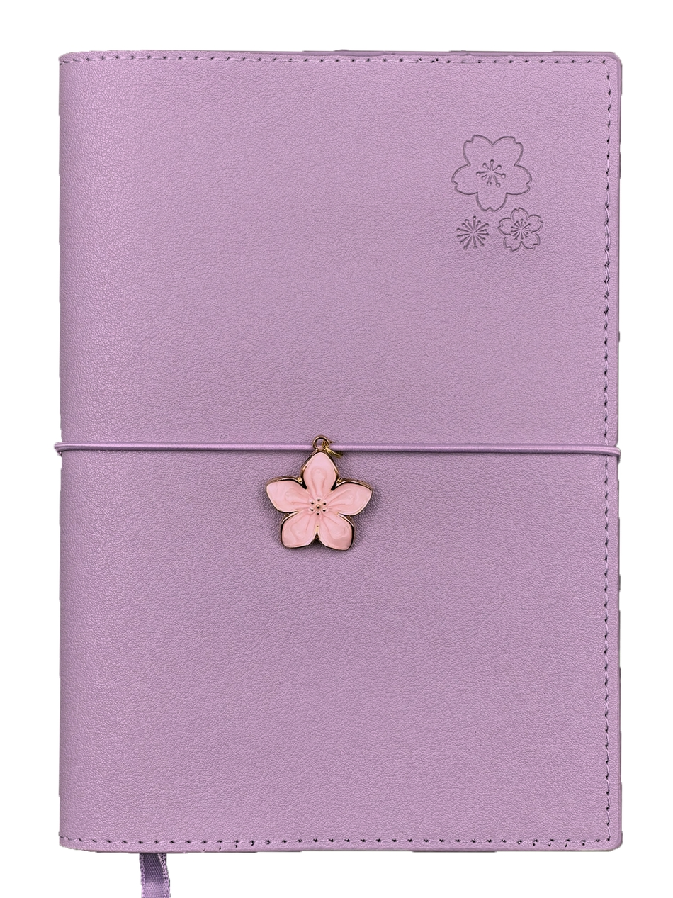 SAKURA journal for girls in stylish fashion colors, high-quality paper, compact and easy to carry, with elastic band and brass floral pendant. By Victoria's Journals. lilac